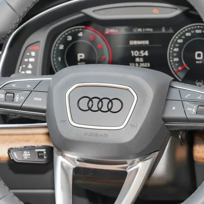 Emblema para volante de coche Audi ABS, pegatina decorativa para A3, A6L, A4L, A8L, A1, A5, A7, Q3, Q5, Q7.