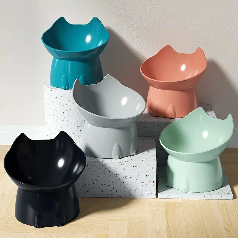 1pc Comedero elevado para gatos, de plástico antivuelco, con borde inclinado y protección para el cuello.
